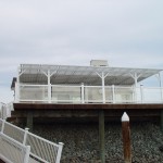 Deck with Glass Railing and Patio Cover